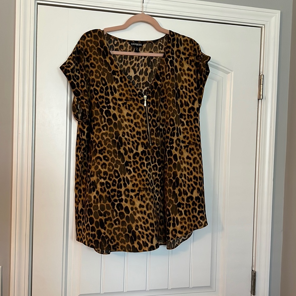 Express short sleeve zip front top